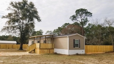 Affordable Living In Freeport w/ Large Lot (0.72 Acres). New on Windswept Dunes Golf Club in Florida - for sale on GolfHomes.com, golf home, golf lot