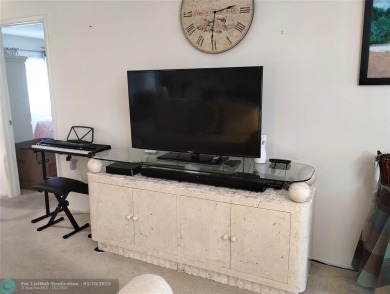 LOVELY 2ND STORY, CORNER 2BR/2BTH CONDO IN THE PEACEFUL BAHAMA on Wynmoor Golf Course in Florida - for sale on GolfHomes.com, golf home, golf lot