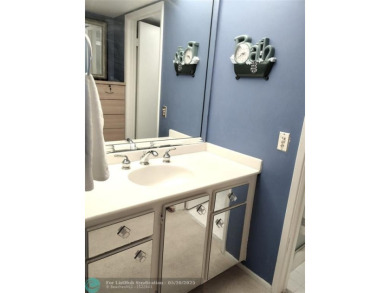 LOVELY 2ND STORY, CORNER 2BR/2BTH CONDO IN THE PEACEFUL BAHAMA on Wynmoor Golf Course in Florida - for sale on GolfHomes.com, golf home, golf lot