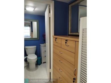 LOVELY 2ND STORY, CORNER 2BR/2BTH CONDO IN THE PEACEFUL BAHAMA on Wynmoor Golf Course in Florida - for sale on GolfHomes.com, golf home, golf lot