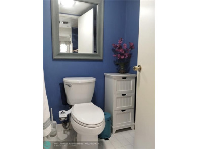 LOVELY 2ND STORY, CORNER 2BR/2BTH CONDO IN THE PEACEFUL BAHAMA on Wynmoor Golf Course in Florida - for sale on GolfHomes.com, golf home, golf lot
