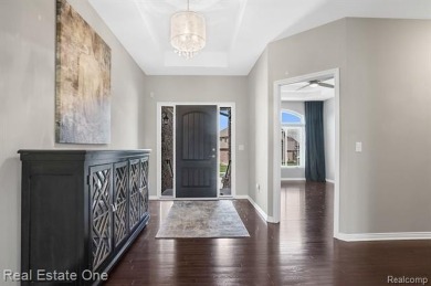 Custom built ranch with finished basement & a covered 288 sf on The Orchards Golf Club in Michigan - for sale on GolfHomes.com, golf home, golf lot