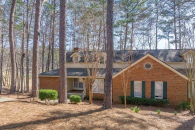 Welcome to this charming 3-bedroom, 3-bathroom cottage nestled on Reynolds Lake Oconee - The Oconee in Georgia - for sale on GolfHomes.com, golf home, golf lot