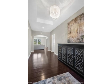 Custom built ranch with finished basement & a covered 288 sf on The Orchards Golf Club in Michigan - for sale on GolfHomes.com, golf home, golf lot