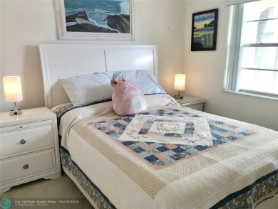 LOVELY 2ND STORY, CORNER 2BR/2BTH CONDO IN THE PEACEFUL BAHAMA on Wynmoor Golf Course in Florida - for sale on GolfHomes.com, golf home, golf lot