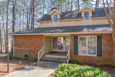 Welcome to this charming 3-bedroom, 3-bathroom cottage nestled on Reynolds Lake Oconee - The Oconee in Georgia - for sale on GolfHomes.com, golf home, golf lot