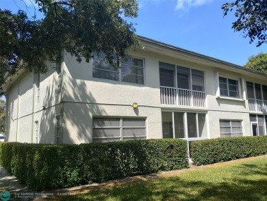 LOVELY 2ND STORY, CORNER 2BR/2BTH CONDO IN THE PEACEFUL BAHAMA on Wynmoor Golf Course in Florida - for sale on GolfHomes.com, golf home, golf lot