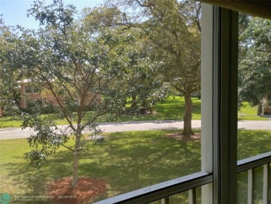 LOVELY 2ND STORY, CORNER 2BR/2BTH CONDO IN THE PEACEFUL BAHAMA on Wynmoor Golf Course in Florida - for sale on GolfHomes.com, golf home, golf lot