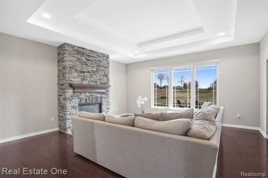 Custom built ranch with finished basement & a covered 288 sf on The Orchards Golf Club in Michigan - for sale on GolfHomes.com, golf home, golf lot
