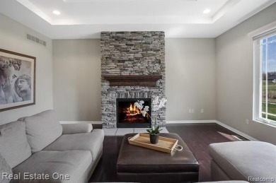 Custom built ranch with finished basement & a covered 288 sf on The Orchards Golf Club in Michigan - for sale on GolfHomes.com, golf home, golf lot