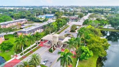 LOVELY 2ND STORY, CORNER 2BR/2BTH CONDO IN THE PEACEFUL BAHAMA on Wynmoor Golf Course in Florida - for sale on GolfHomes.com, golf home, golf lot