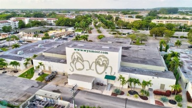 LOVELY 2ND STORY, CORNER 2BR/2BTH CONDO IN THE PEACEFUL BAHAMA on Wynmoor Golf Course in Florida - for sale on GolfHomes.com, golf home, golf lot