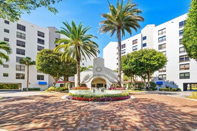 Located in a quiet gated enclave within Boca Pointe on Boca Pointe Country Club in Florida - for sale on GolfHomes.com, golf home, golf lot