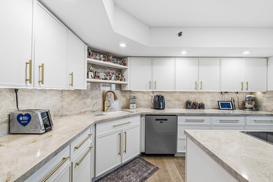 Located in a quiet gated enclave within Boca Pointe on Boca Pointe Country Club in Florida - for sale on GolfHomes.com, golf home, golf lot