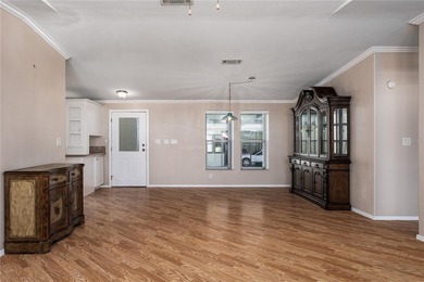 Well-Maintained 3BR Palm Harbor Home with New Roof & A/C! on Imperial Lakewoods Golf Club in Florida - for sale on GolfHomes.com, golf home, golf lot