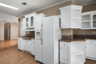 Well-Maintained 3BR Palm Harbor Home with New Roof & A/C! on Imperial Lakewoods Golf Club in Florida - for sale on GolfHomes.com, golf home, golf lot