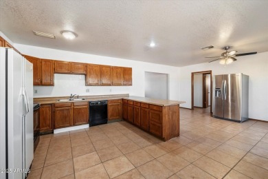 Talk about Tee-Time! Welcome to this great opportunity situated on Arizona City Golf Club in Arizona - for sale on GolfHomes.com, golf home, golf lot
