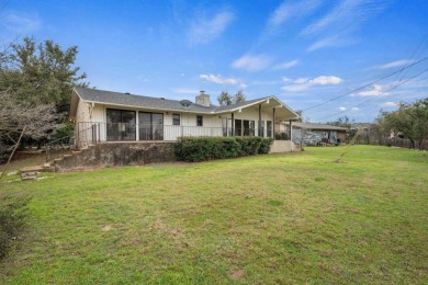 This charming single-story stone home, nestled in the heart of on Lakeway Golf and Country Club in Texas - for sale on GolfHomes.com, golf home, golf lot