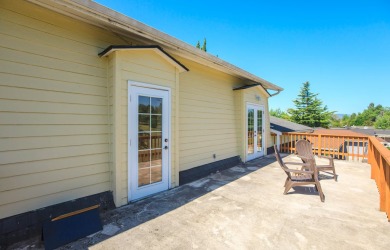 This East Medford Colonial style home with many updates sits on on Rogue Valley Country Club in Oregon - for sale on GolfHomes.com, golf home, golf lot