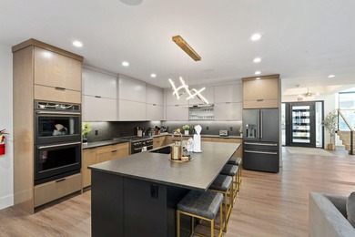 Welcome to this exceptional 7-bedroom luxury retreat, fully on Copper Rock Golf Course in Utah - for sale on GolfHomes.com, golf home, golf lot