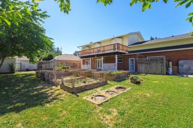 This East Medford Colonial style home with many updates sits on on Rogue Valley Country Club in Oregon - for sale on GolfHomes.com, golf home, golf lot