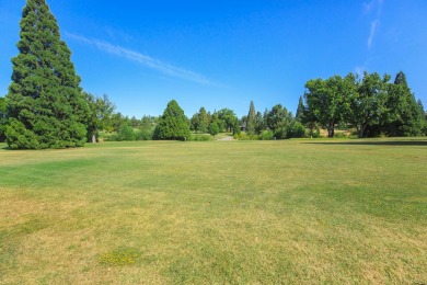 This East Medford Colonial style home with many updates sits on on Rogue Valley Country Club in Oregon - for sale on GolfHomes.com, golf home, golf lot