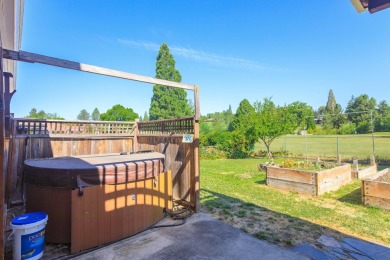 This East Medford Colonial style home with many updates sits on on Rogue Valley Country Club in Oregon - for sale on GolfHomes.com, golf home, golf lot