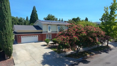 This East Medford Colonial style home with many updates sits on on Rogue Valley Country Club in Oregon - for sale on GolfHomes.com, golf home, golf lot