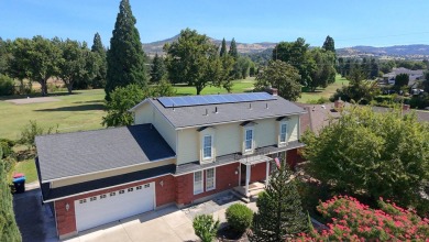 This East Medford Colonial style home with many updates sits on on Rogue Valley Country Club in Oregon - for sale on GolfHomes.com, golf home, golf lot