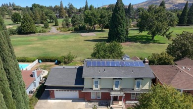 This East Medford Colonial style home with many updates sits on on Rogue Valley Country Club in Oregon - for sale on GolfHomes.com, golf home, golf lot