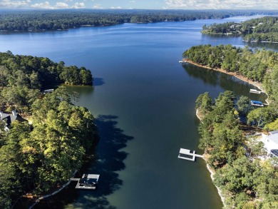 Seize this rare opportunity to own a stunning lakefront lot in on Reynolds Lake Oconee - The Oconee in Georgia - for sale on GolfHomes.com, golf home, golf lot