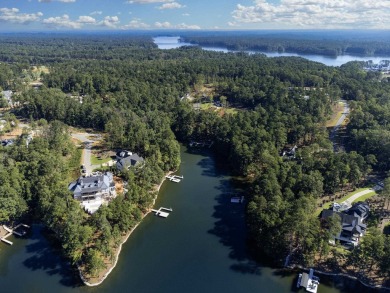 Seize this rare opportunity to own a stunning lakefront lot in on Reynolds Lake Oconee - The Oconee in Georgia - for sale on GolfHomes.com, golf home, golf lot