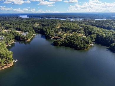 Seize this rare opportunity to own a stunning lakefront lot in on Reynolds Lake Oconee - The Oconee in Georgia - for sale on GolfHomes.com, golf home, golf lot