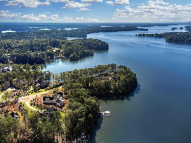 Seize this rare opportunity to own a stunning lakefront lot in on Reynolds Lake Oconee - The Oconee in Georgia - for sale on GolfHomes.com, golf home, golf lot
