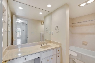 SPACIOUS ONE BEDROOM CONDO OVERLOOKING THE COURTYARD WITH ONE on BallenIsles Golf and Country Club in Florida - for sale on GolfHomes.com, golf home, golf lot