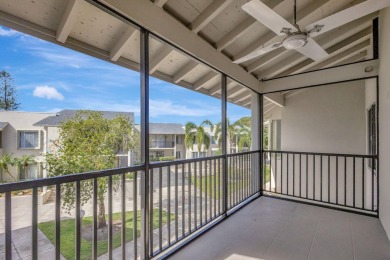 SPACIOUS ONE BEDROOM CONDO OVERLOOKING THE COURTYARD WITH ONE on BallenIsles Golf and Country Club in Florida - for sale on GolfHomes.com, golf home, golf lot