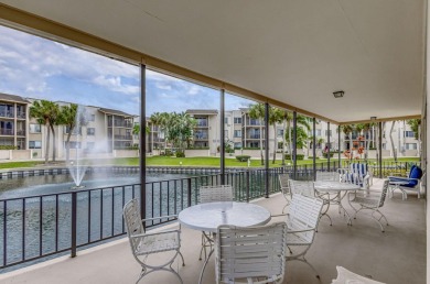 SPACIOUS ONE BEDROOM CONDO OVERLOOKING THE COURTYARD WITH ONE on BallenIsles Golf and Country Club in Florida - for sale on GolfHomes.com, golf home, golf lot