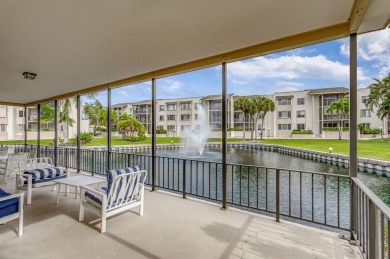 SPACIOUS ONE BEDROOM CONDO OVERLOOKING THE COURTYARD WITH ONE on BallenIsles Golf and Country Club in Florida - for sale on GolfHomes.com, golf home, golf lot