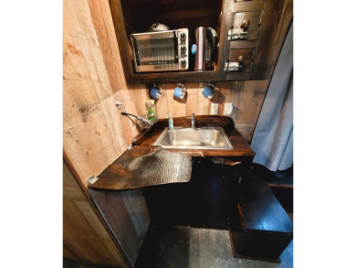 You have got to come and see this ''Tiny Home'' which has been on Lakewood Golf Course in Maine - for sale on GolfHomes.com, golf home, golf lot