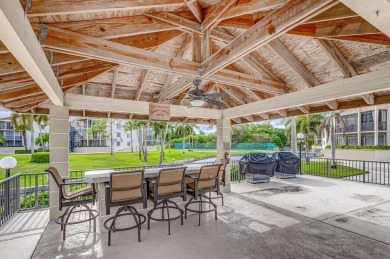 SPACIOUS ONE BEDROOM CONDO OVERLOOKING THE COURTYARD WITH ONE on BallenIsles Golf and Country Club in Florida - for sale on GolfHomes.com, golf home, golf lot