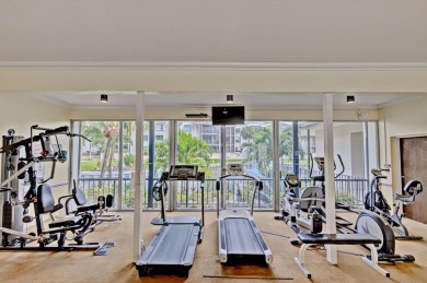 SPACIOUS ONE BEDROOM CONDO OVERLOOKING THE COURTYARD WITH ONE on BallenIsles Golf and Country Club in Florida - for sale on GolfHomes.com, golf home, golf lot