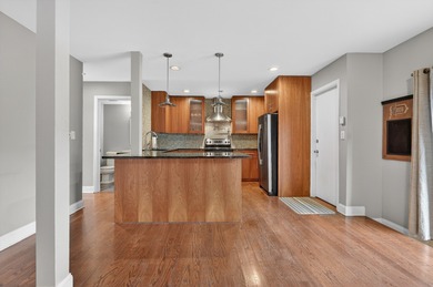 Beautiful townhome with mid century modern touches set on a on Old Orchard Country Club in Illinois - for sale on GolfHomes.com, golf home, golf lot