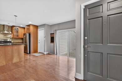 Beautiful townhome with mid century modern touches set on a on Old Orchard Country Club in Illinois - for sale on GolfHomes.com, golf home, golf lot