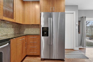 Beautiful townhome with mid century modern touches set on a on Old Orchard Country Club in Illinois - for sale on GolfHomes.com, golf home, golf lot