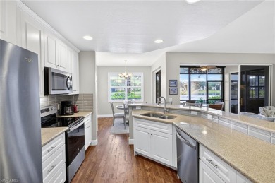 This lovely, first floor end unit coach home shows like new on Pelican Sound Golf and River Club in Florida - for sale on GolfHomes.com, golf home, golf lot
