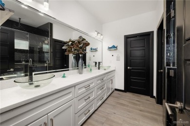 Experience the pinnacle of upscale living in this exquisite on Los Lagos Golf Club in Texas - for sale on GolfHomes.com, golf home, golf lot