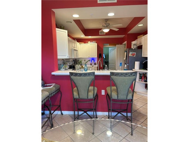 Beautifully Furnished End Unit with Lake Views! Discover the on Cypress Woods Golf and Country Club in Florida - for sale on GolfHomes.com, golf home, golf lot