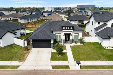Experience the pinnacle of upscale living in this exquisite on Los Lagos Golf Club in Texas - for sale on GolfHomes.com, golf home, golf lot