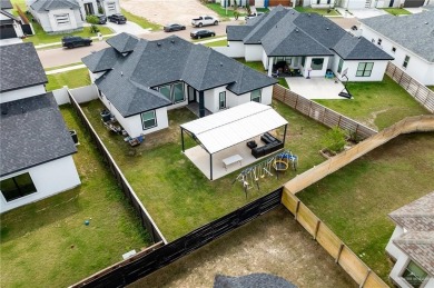 Experience the pinnacle of upscale living in this exquisite on Los Lagos Golf Club in Texas - for sale on GolfHomes.com, golf home, golf lot