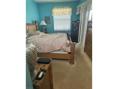 Beautifully Furnished End Unit with Lake Views! Discover the on Cypress Woods Golf and Country Club in Florida - for sale on GolfHomes.com, golf home, golf lot